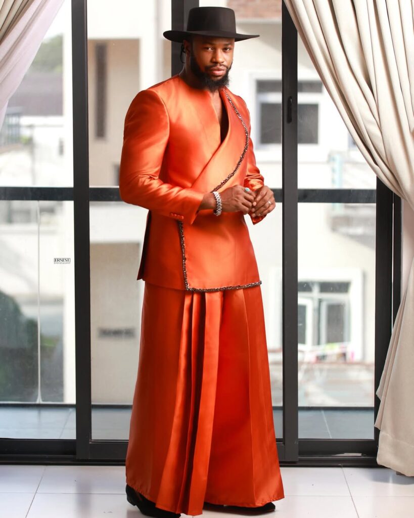 Nigerian youth wearing oversized blazers and gender-neutral styles