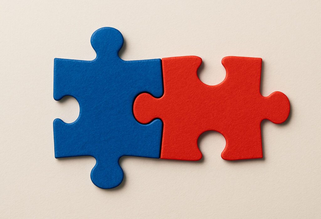 Two puzzle pieces symbolizing individuality and connection in a relationship.